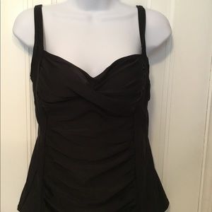 Tankini top. Never worn.  Size large.  Soft cups.